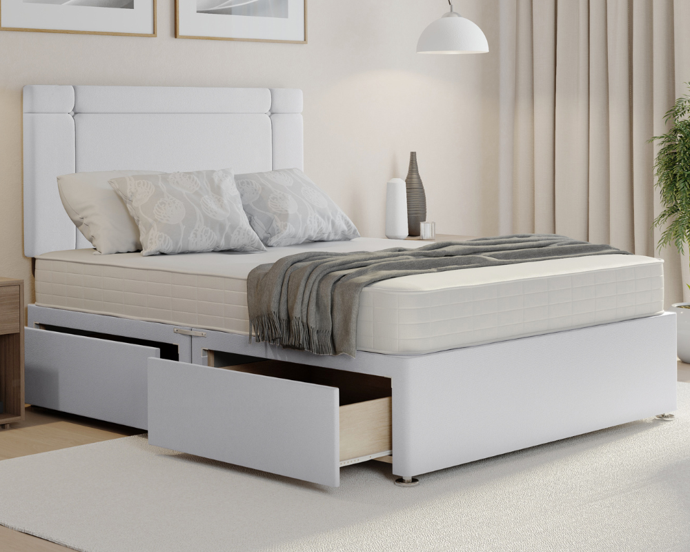 white plush clima style divan bed set with mattress and drawers.